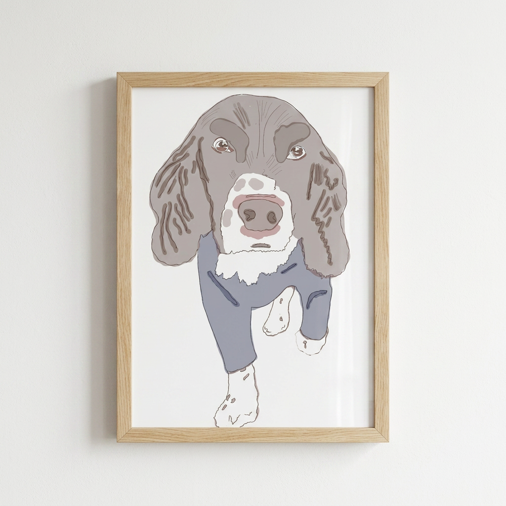 Illustrated spaniel portrait as an A4 print in an oak frame on a white wall